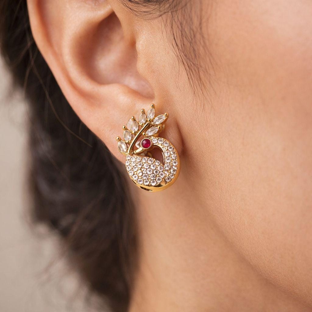 PEACOCK SHAPE STUDS WITH GOLD TONED PLATING