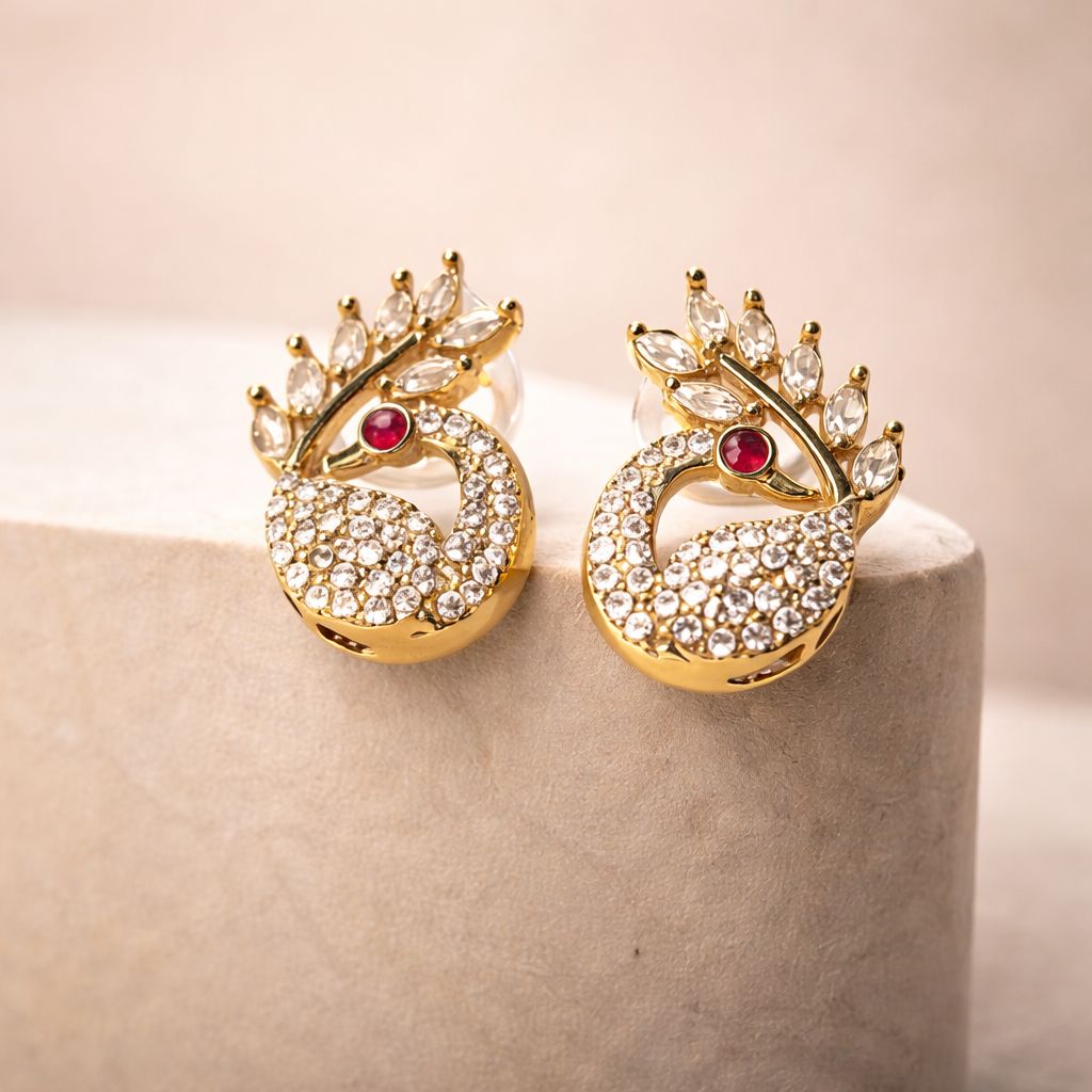 PEACOCK SHAPE STUDS WITH GOLD TONED PLATING